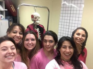 Students from the Fort Collins campus representing their pink in their Kinesiology class.